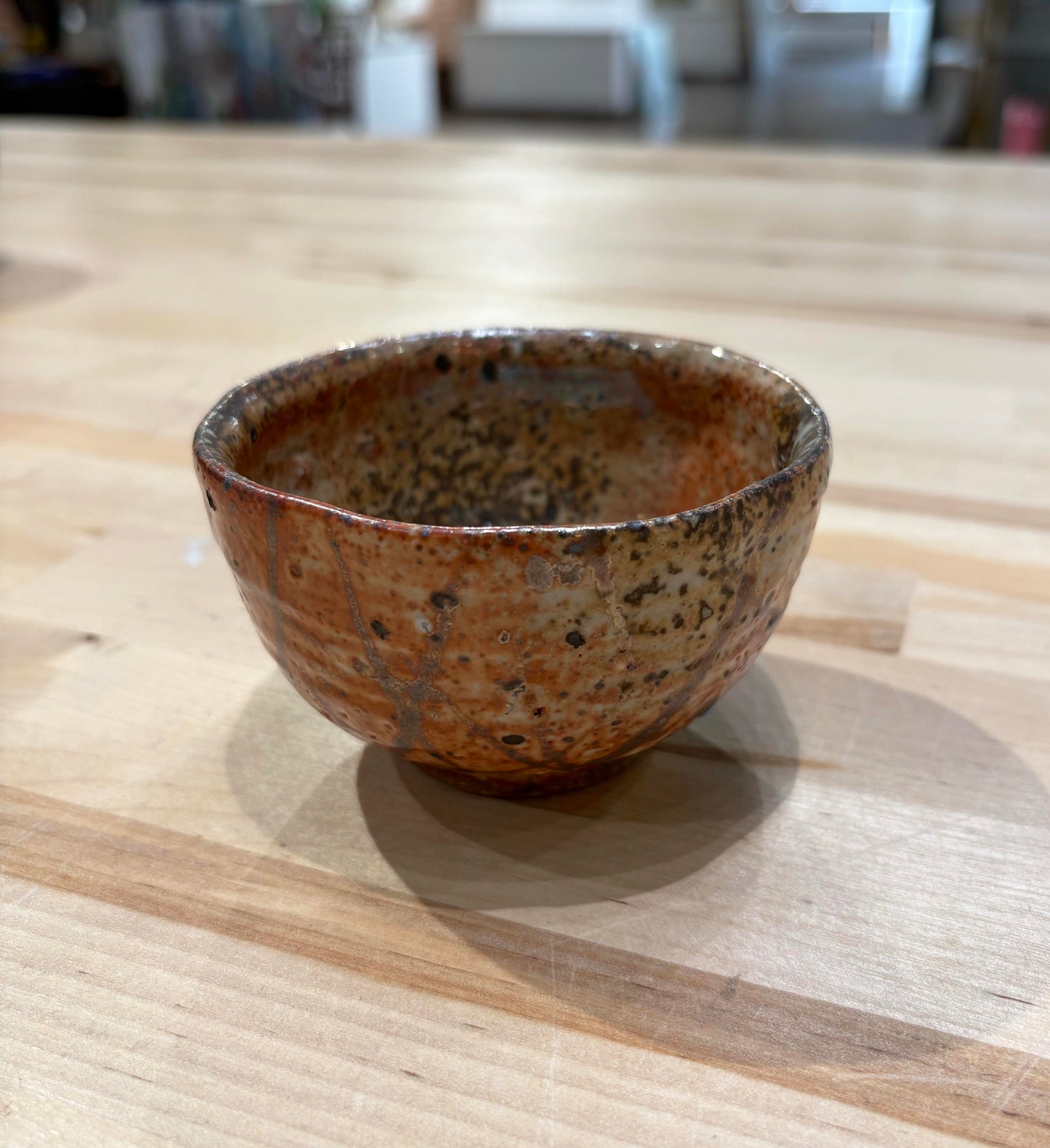 Small Rust Bowl With Brown Markings